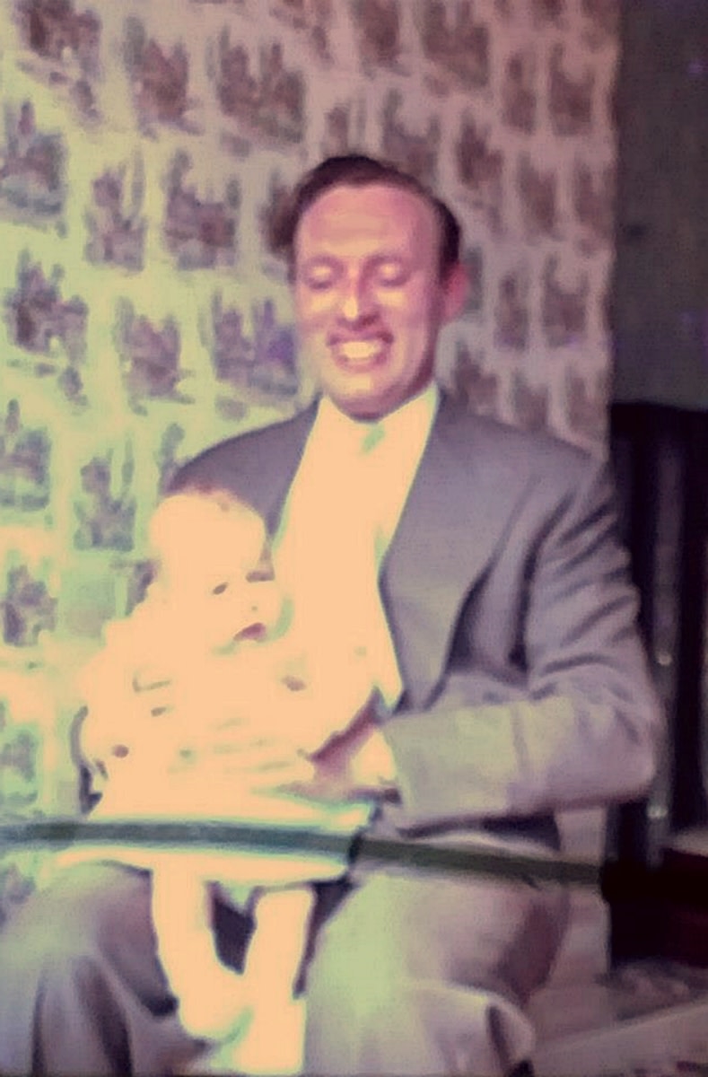 My dad, Richard Evans, pictured with me when I was only a few weeks old.