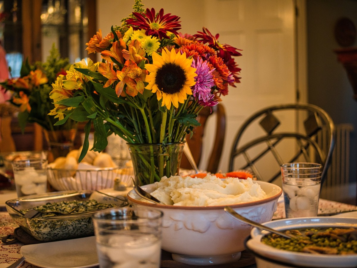 There are delicious alternatives to serving meat products on Thanksgiving. Set a beautiful table with fresh vegetables, mashed potatoes and soup dishes.