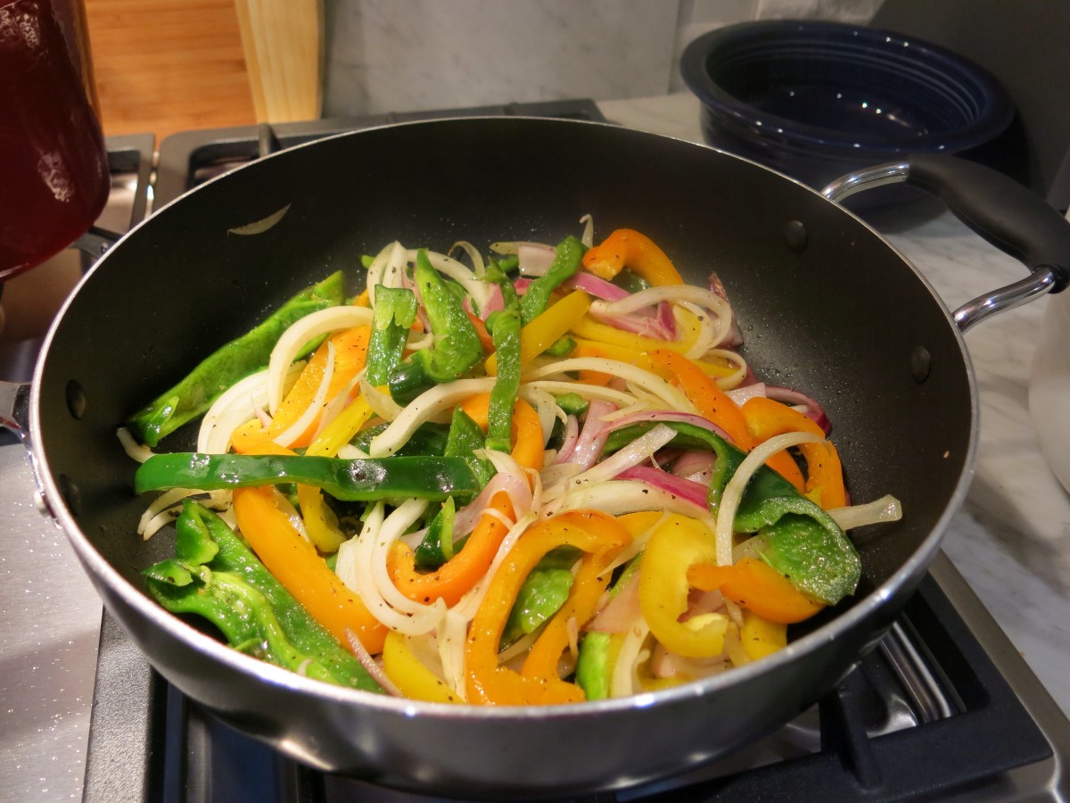Stir fry peppers & onions on high heat