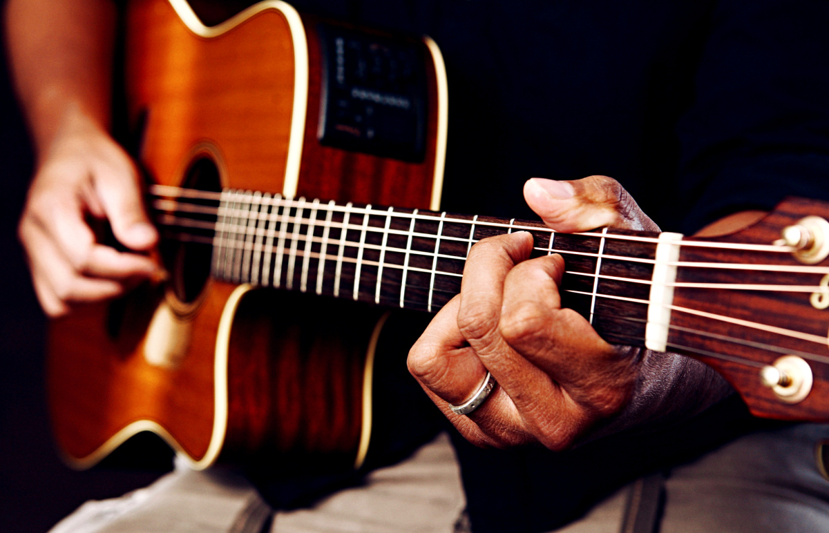 Whether your guitar is sharp or flat is less important than that it's in tune with itself.