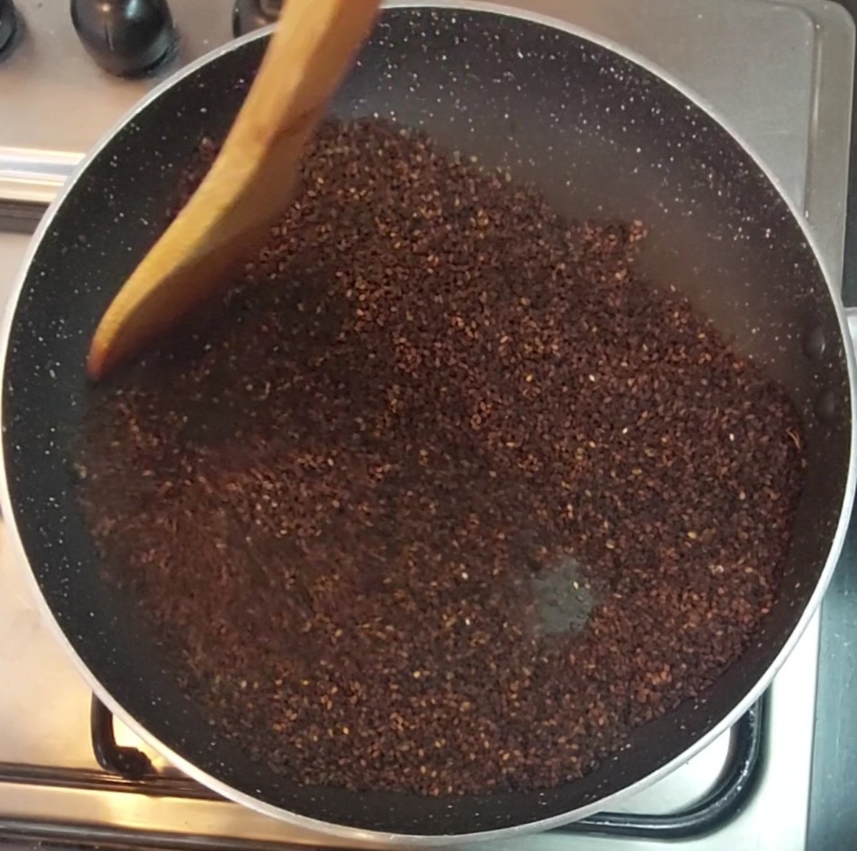 In a frying pan, add 1 cup of black sesame seeds. Fry over medium flame for 5 minutes or till aromatic. Transfer to a plate.