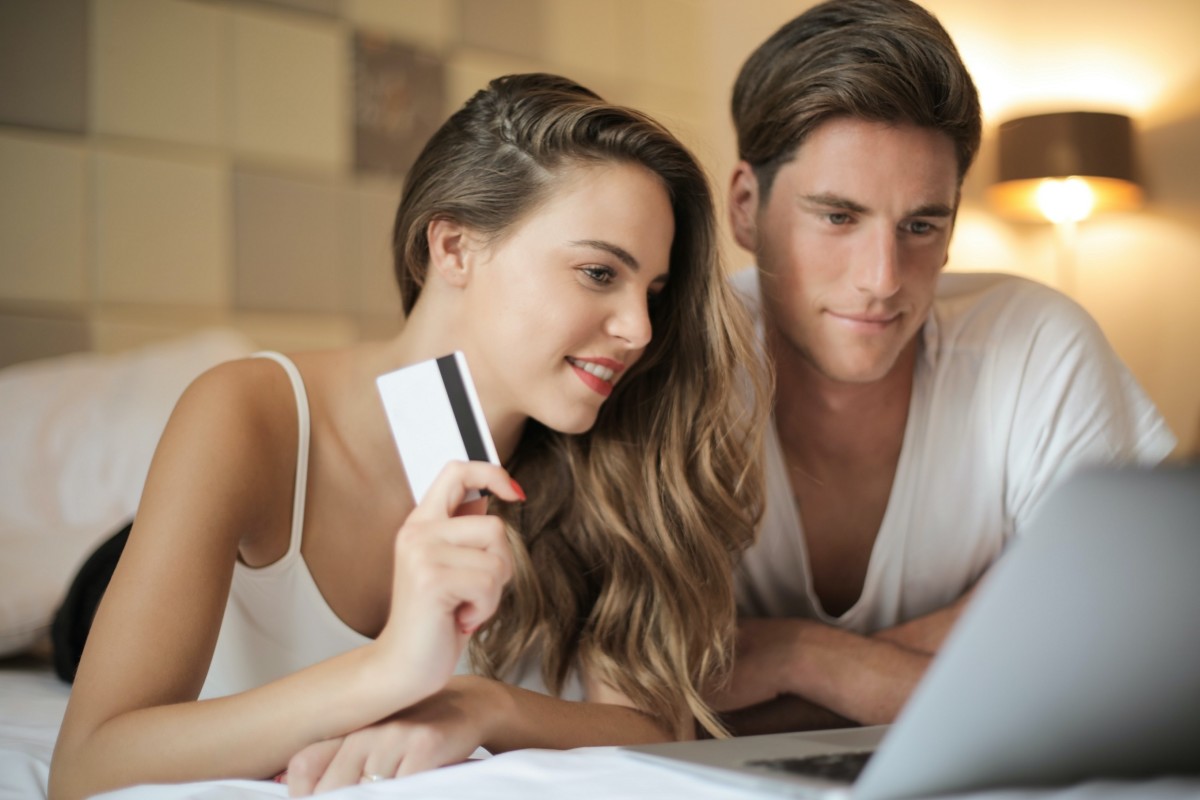 Couples should work together on credit card purchases and sticking to a budget.
