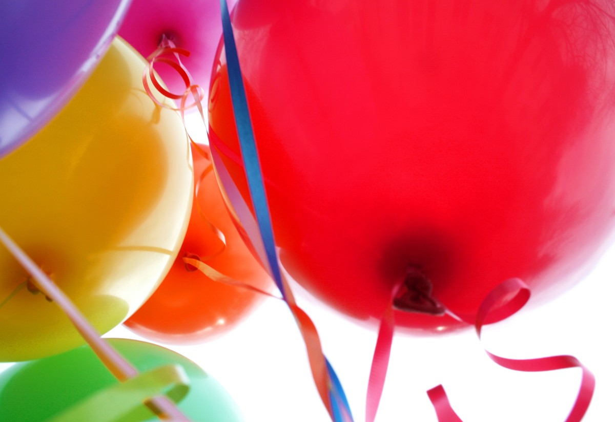 Balloons are a fun and inexpensive decoration. But take care that too many balloons on the floor leads to loud popping and overstimulation. Be mindful this may be upsetting to young toddlers.