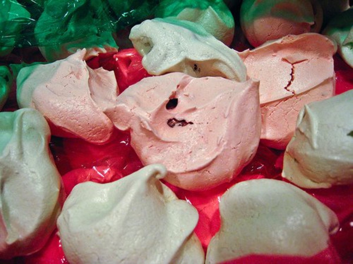 Add a few drops of red food coloring to the egg whites for pink meringue cookies. For white rather than browned (toasted) meringue cookies, use the second baking option in step #5.