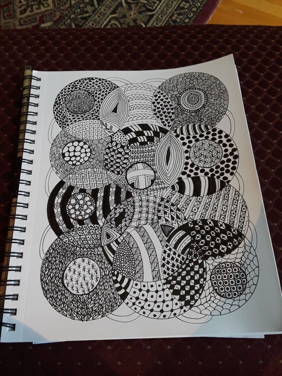 This was a blank page when I started. I traced some circles onto the paper and just began to doodle inside them.