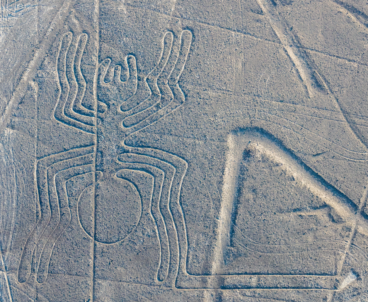 The Nazca Spider in Peru measures 150 feet and is defined by one continuous line carved into the desert floor.