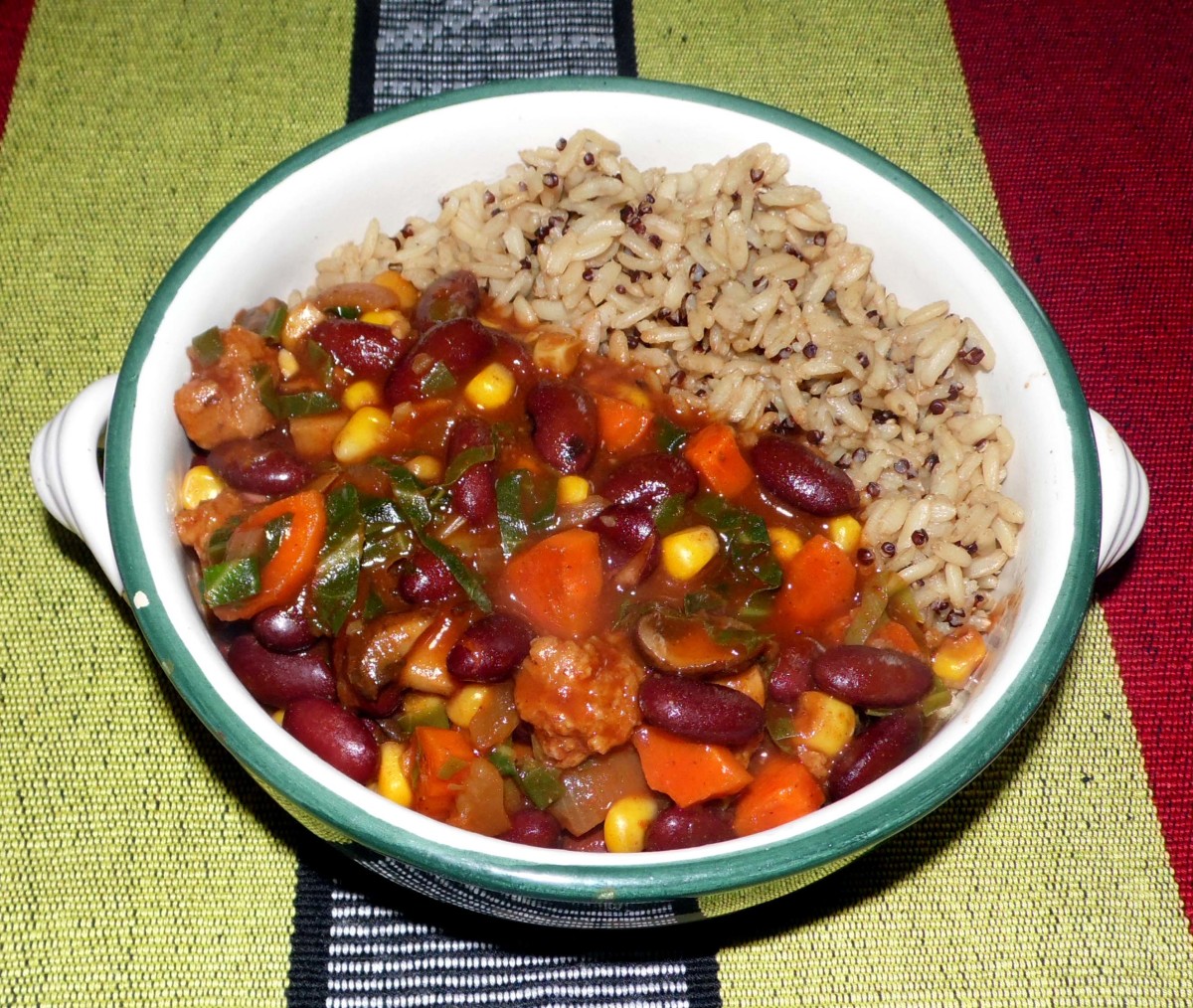 Vegaetable chilli stew with TVP chunks, served with brown rice and quinoa.