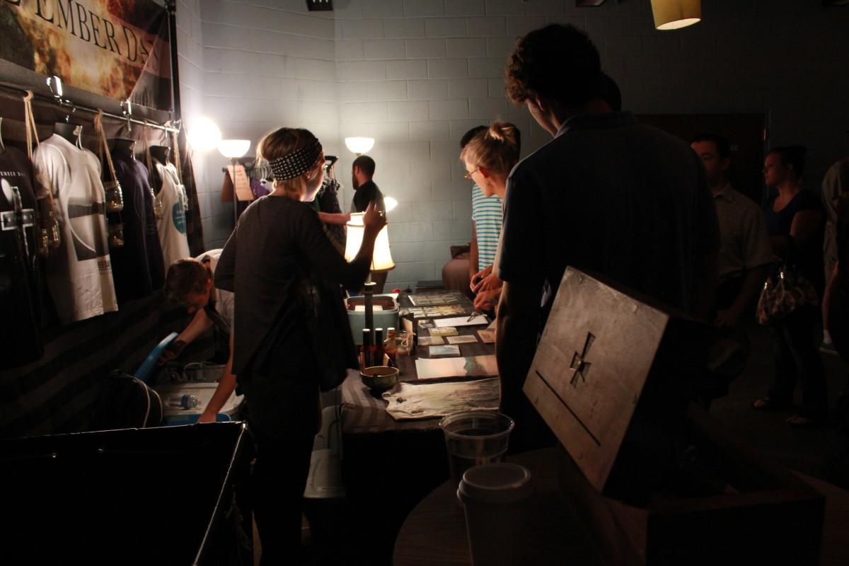 Indie band The Ember Days merch table.
