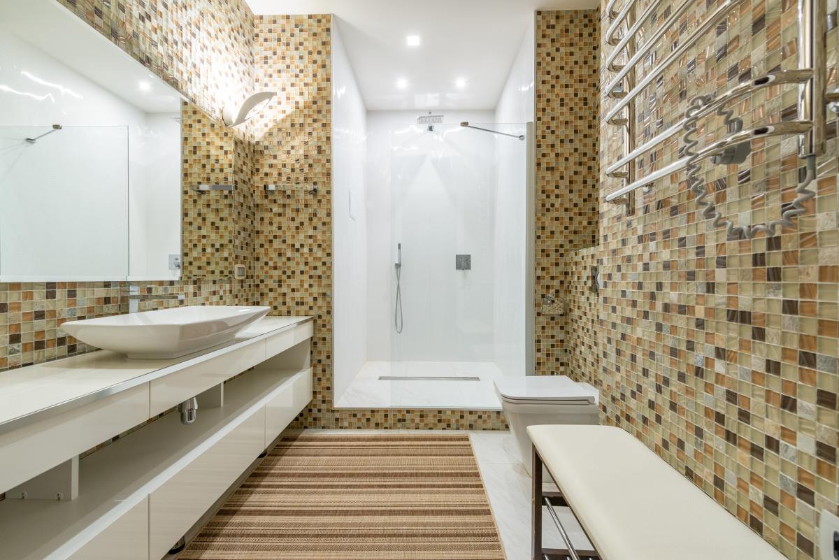 Consider using tiles in different shades of brown for the bathroom.