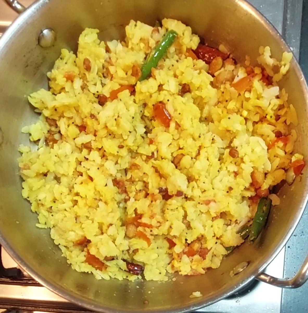 Mix well but take care not to not break the poha.