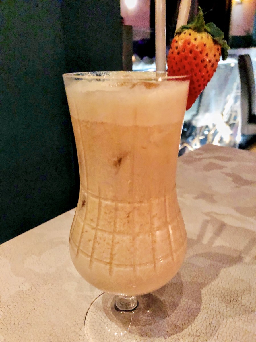 A piña colada cocktail served at an aperitivo near Corso Como.