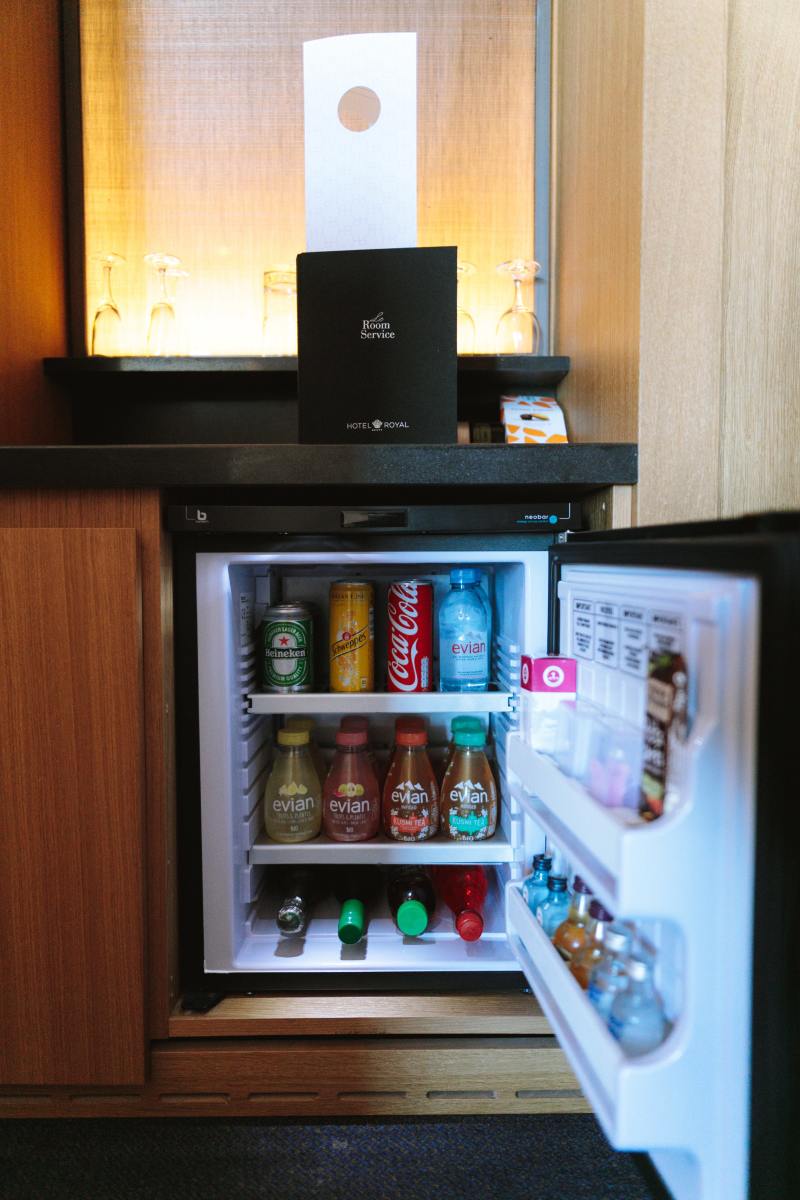 I know this picture is full of soda and other drinks, but imagine a whole mini fridge dedicated to breast milk, and it's in a convenient spot for when you nurse your baby.