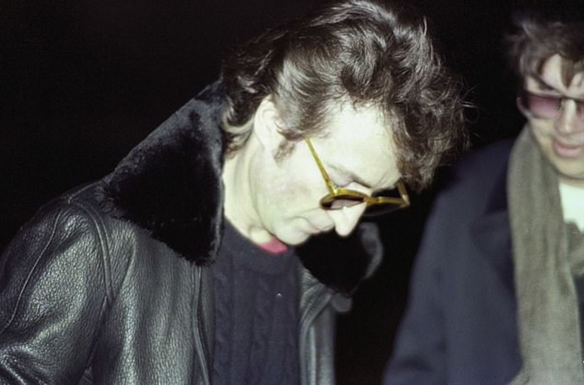 John Lennon signs an album for his soon to be assassin Mark David Chapman