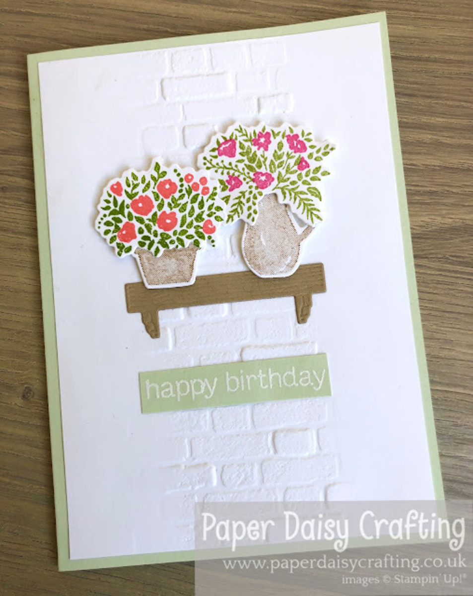 Center partial embossing is easy. You simply mark off the areas where you don't want to emboss. Run one side through and then the other. Great way to highlight an area