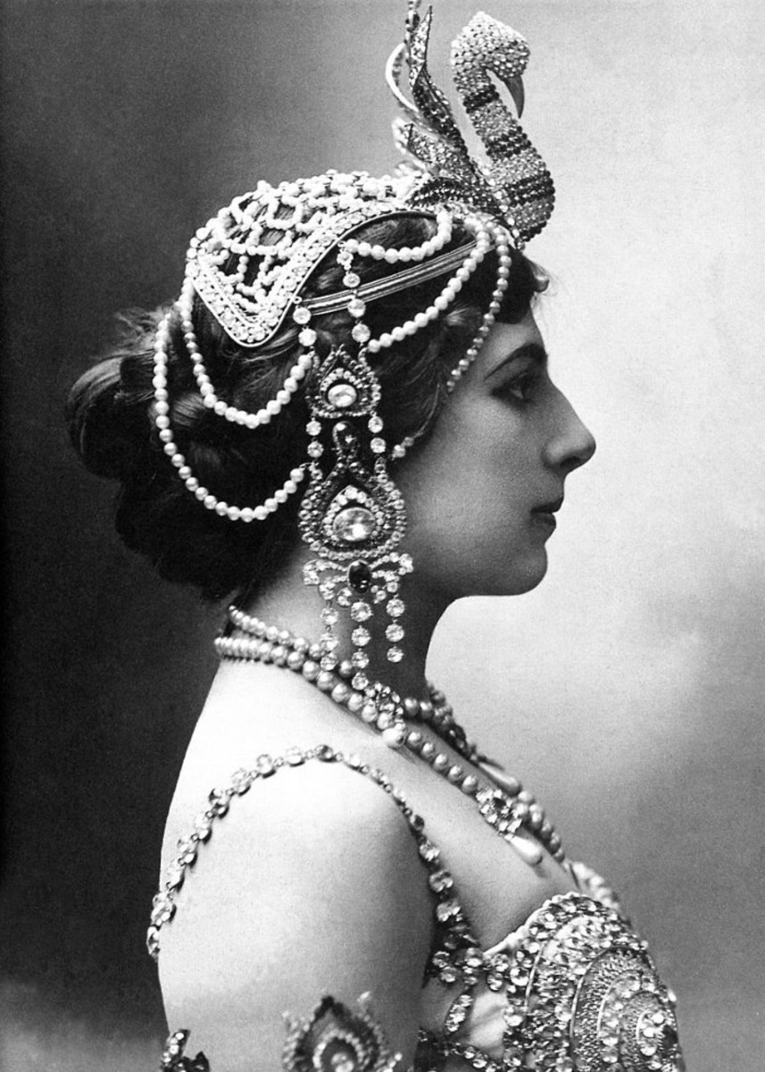 In 1910 wearing a jeweled head-dress-