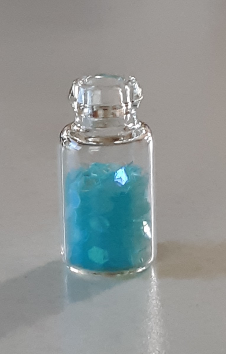 The Hexagon glitter is ideal as mermaid scales. leave small space between top of bottle and level of glitter, so that the seashell will be clearly seen.