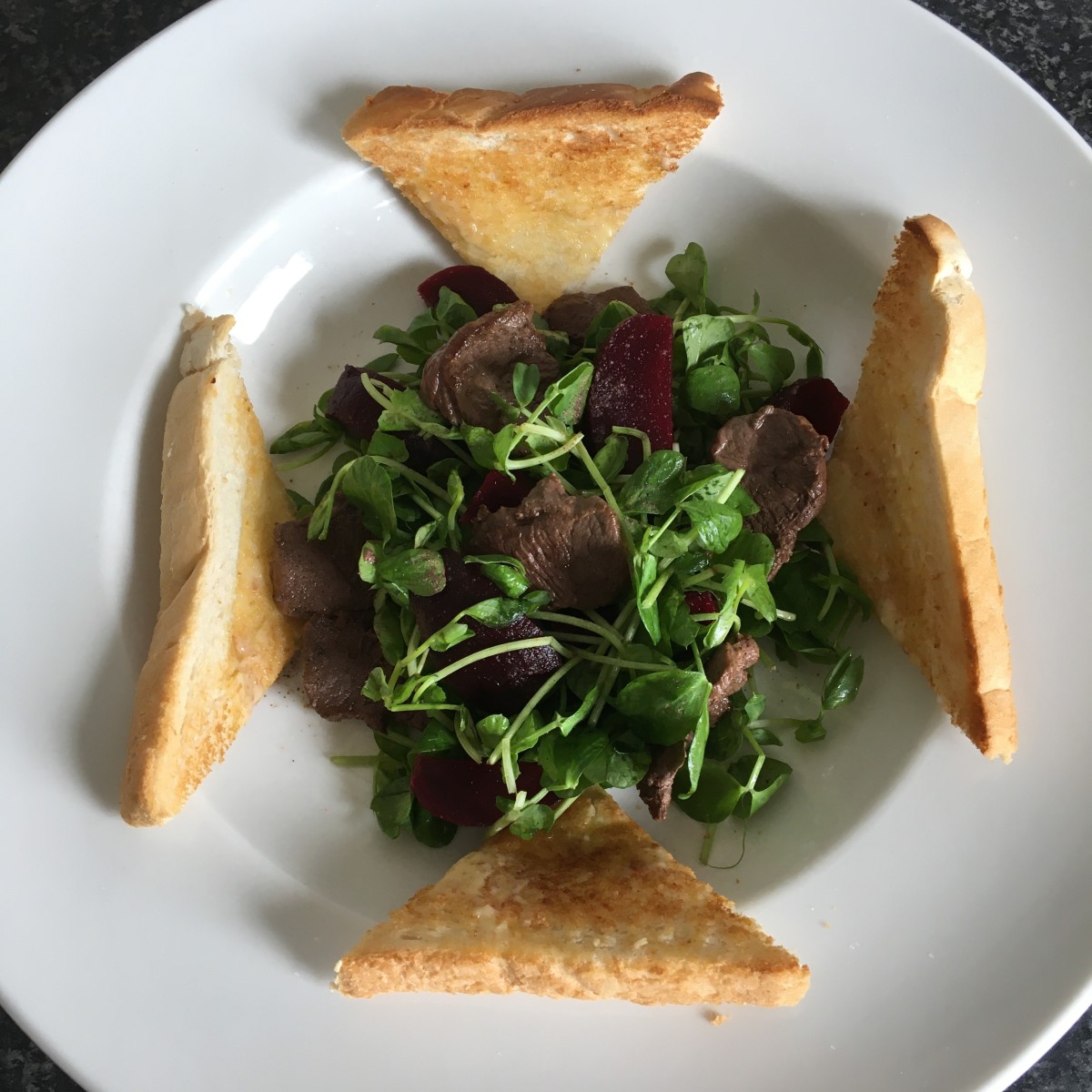 Wild goose, beetroot and peashoot salad with toast