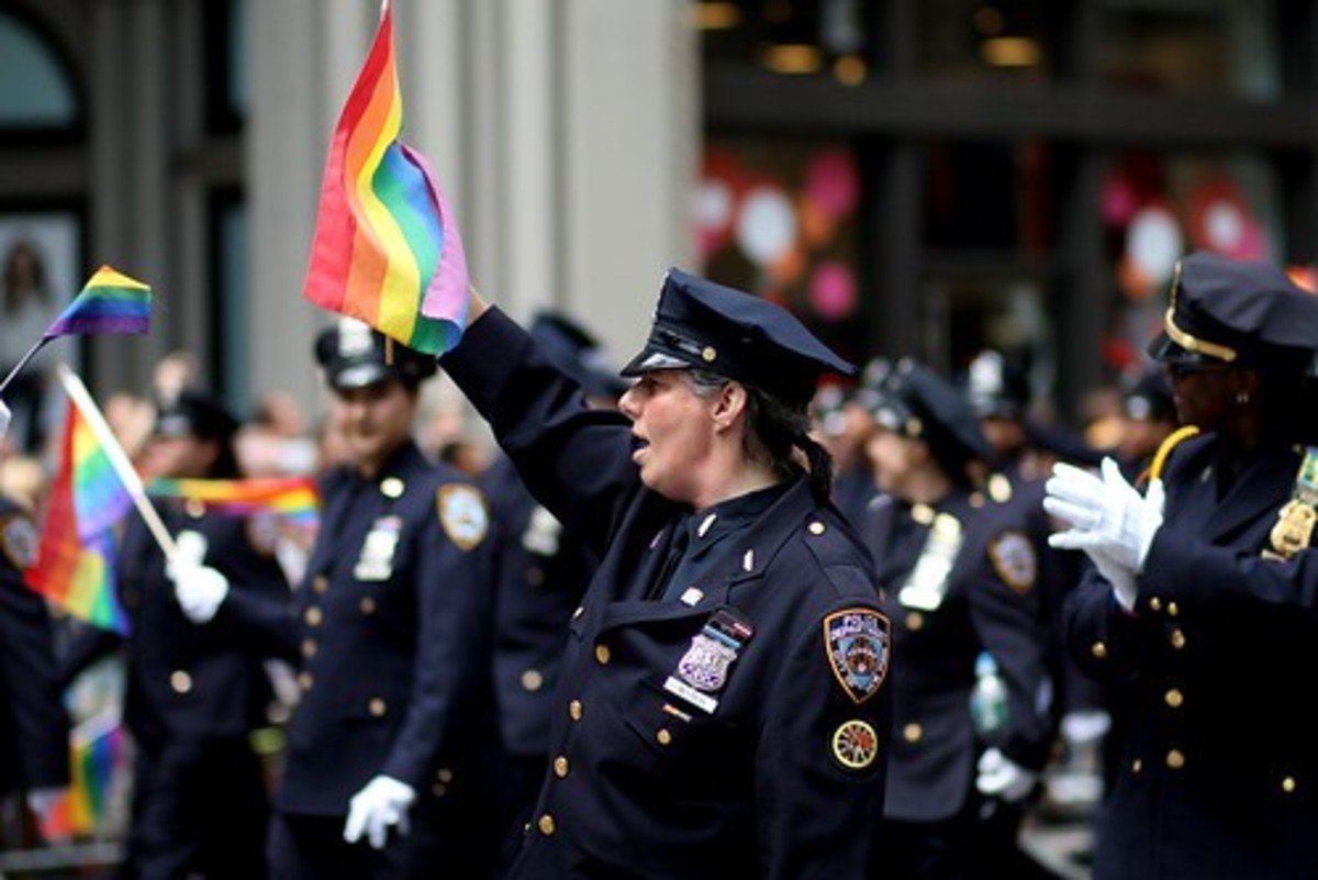 New York City police officers march in a Gay Pride parade.