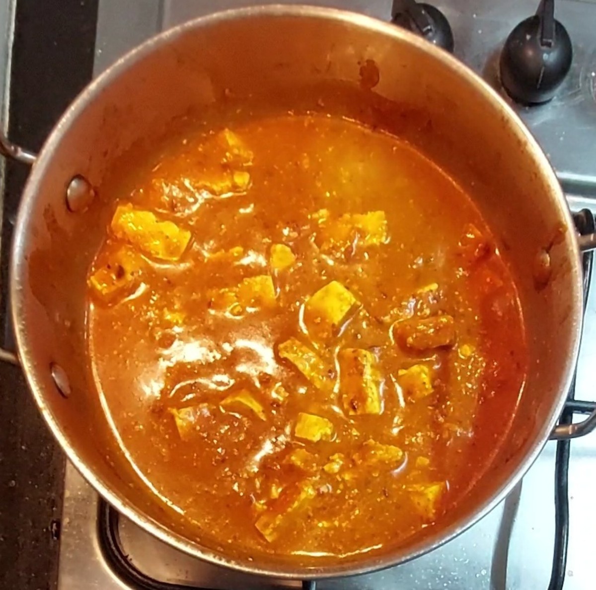 Mix gently without breaking paneer cubes. Add 1/2 cup of water and mix. Close the lid and cook for 2 minutes.