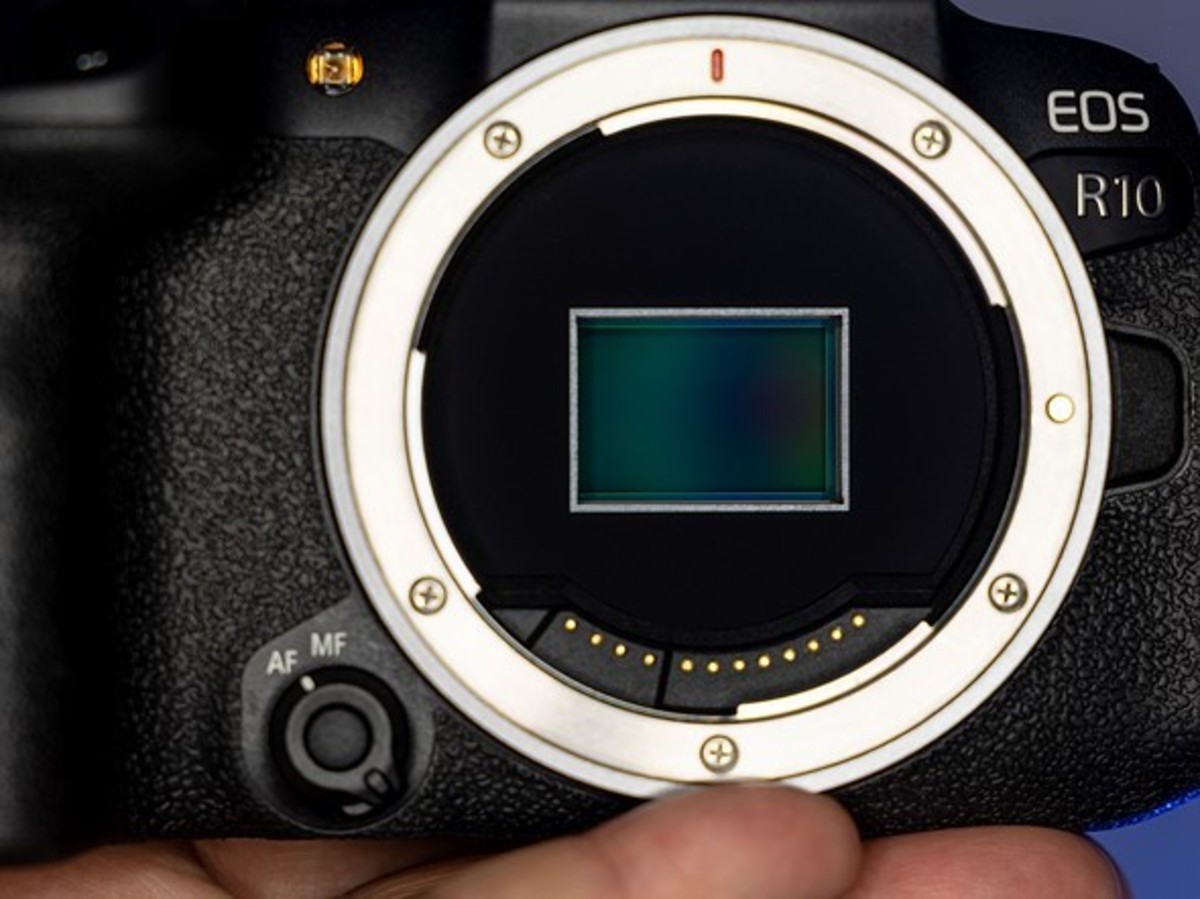 The Canon EOS R10 has a mode dial on the top of the camera.
