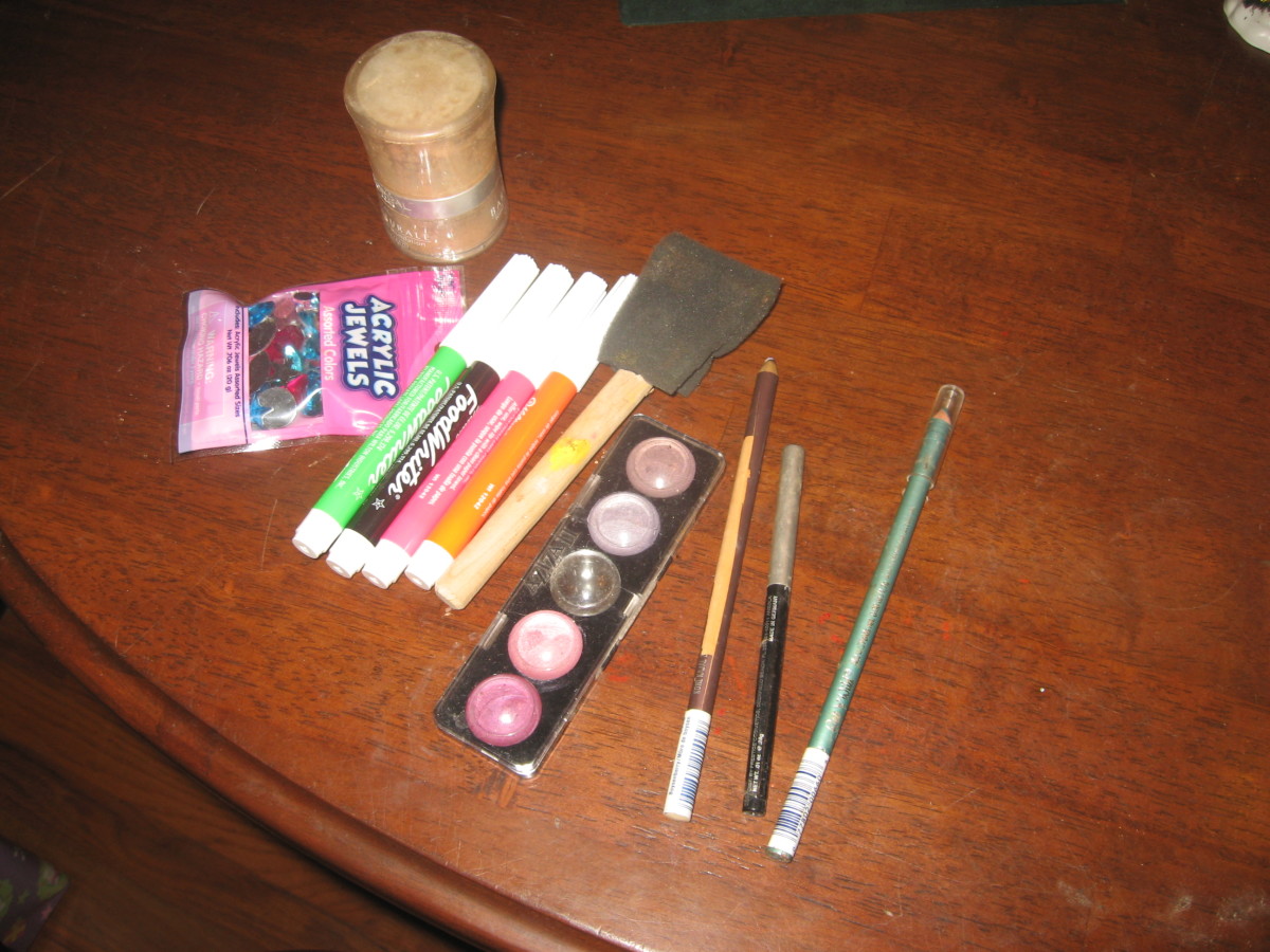 In addition to Face Paints, I use FoodWriters, foundation, eyeshadow, eyeliner pencils, powder, and acrylic jewels. 