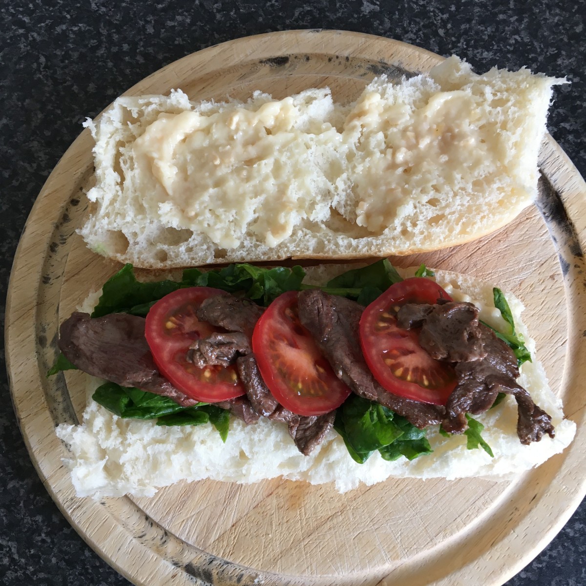 Goose, spinach and tomato with horseradish sauce sub roll