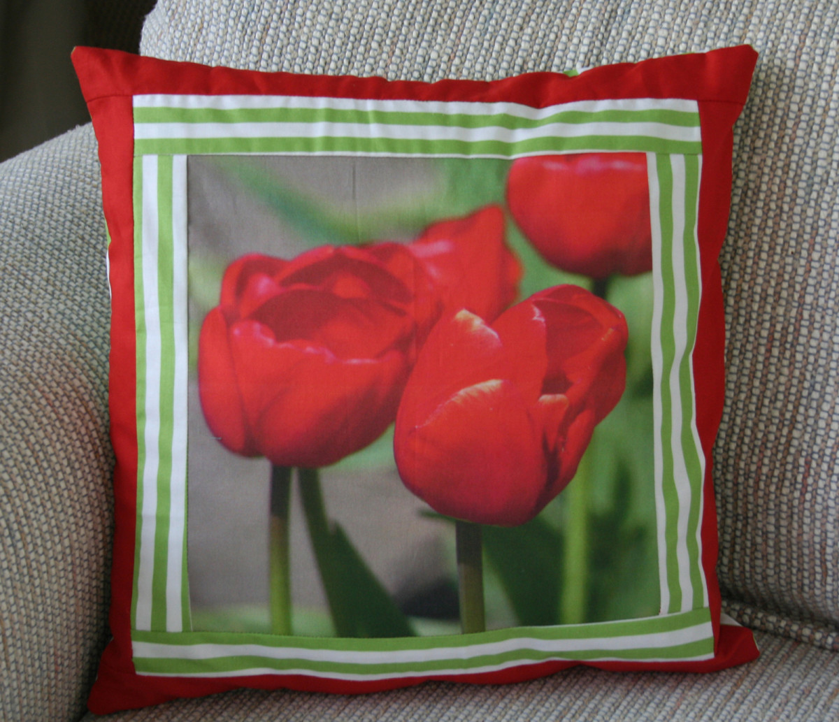 My beautiful red tulips on throw pillow.