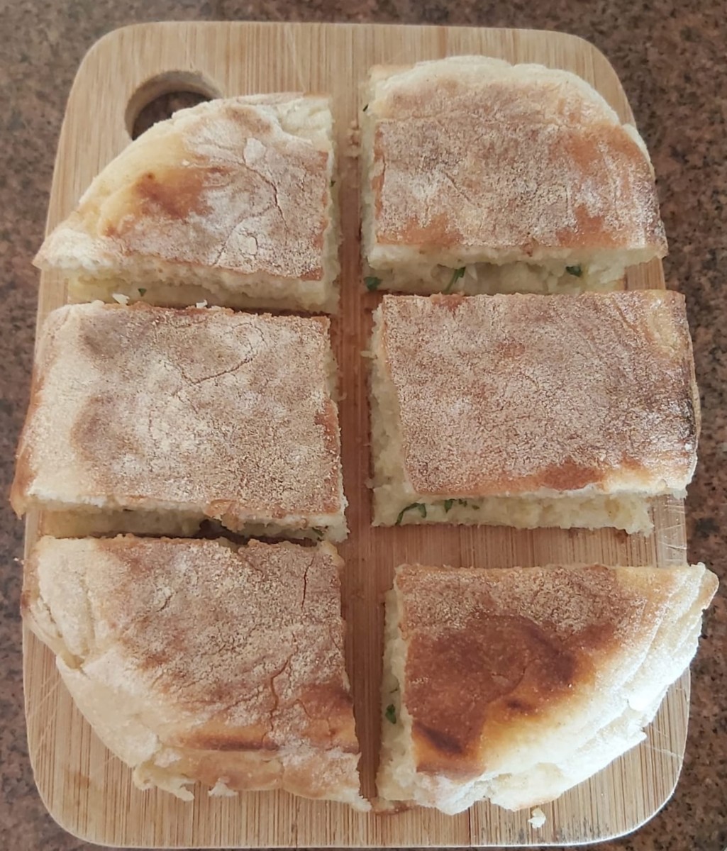I like to serve this dish with bolo de caco, a traditional island garlic bread.
