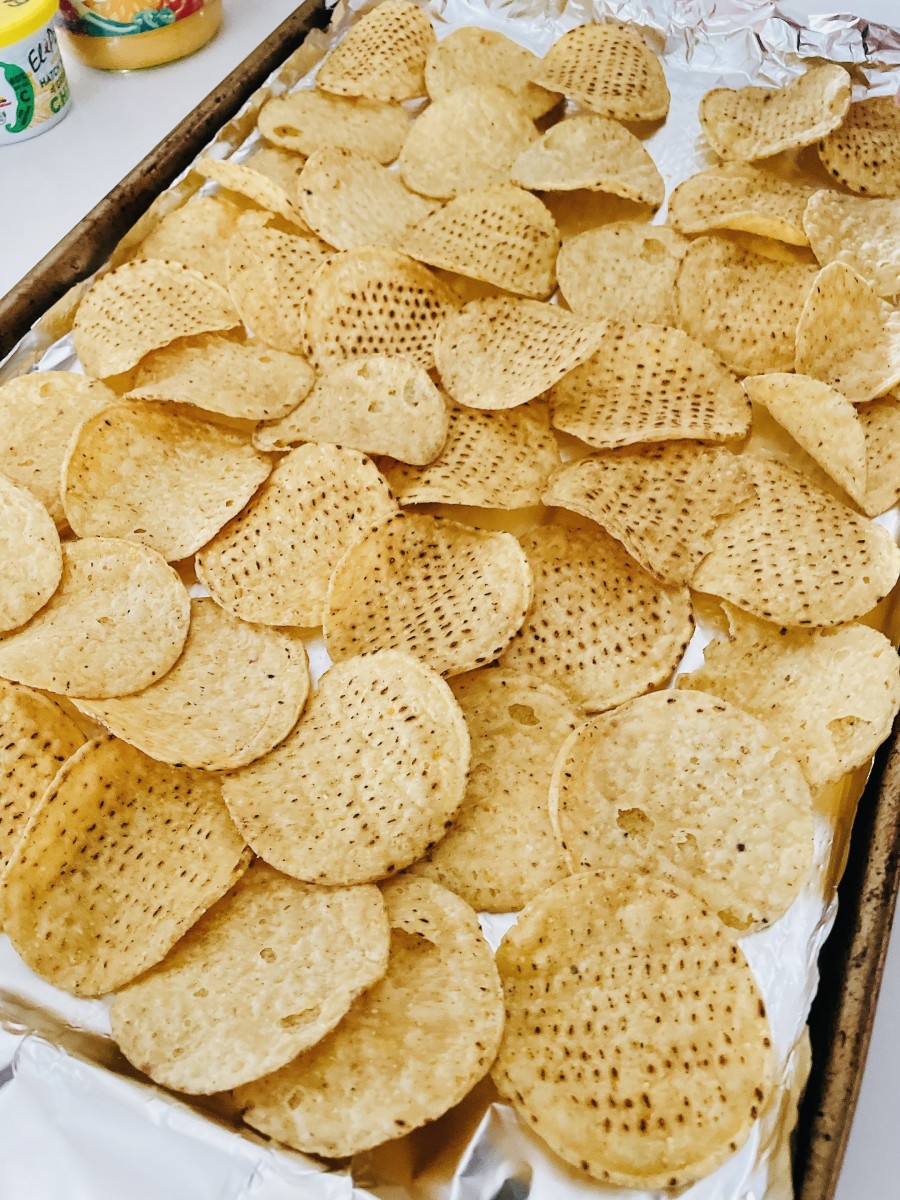 Spread the tortilla chips over the pan equally.