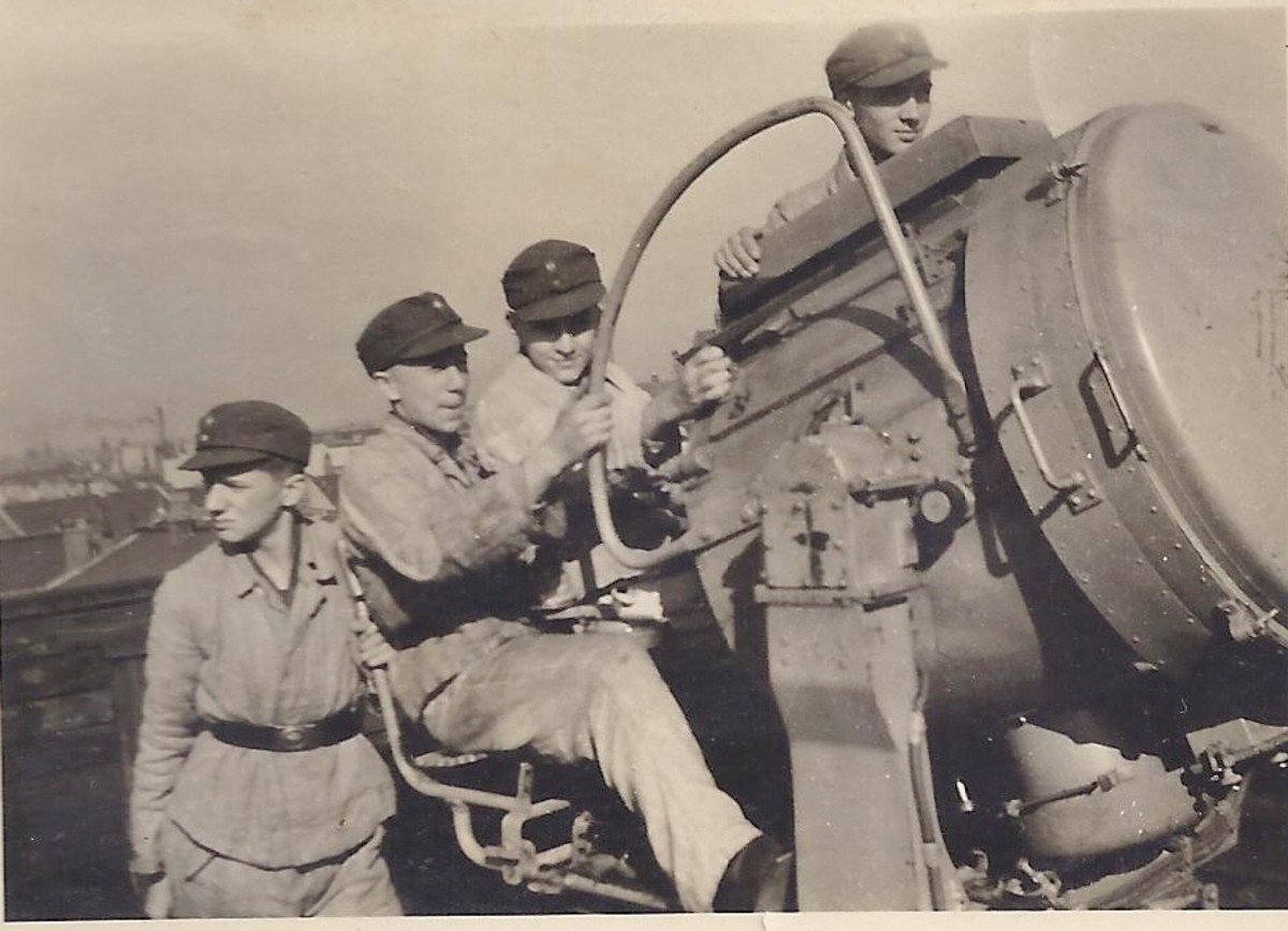 Flakhelfers pictured manning a searchlight in Berlin in 1943. Recruited among adolescents too young for military service, the Flakhelfers are sometimes considered emblematic of the generation who grew up under the Nazi regime.