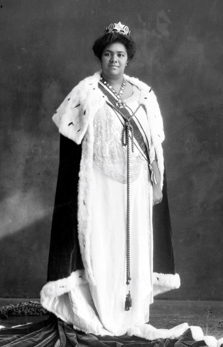 Queen Salote Topou III of Tonga in her coronation robes. She was 6ft 3in tall.