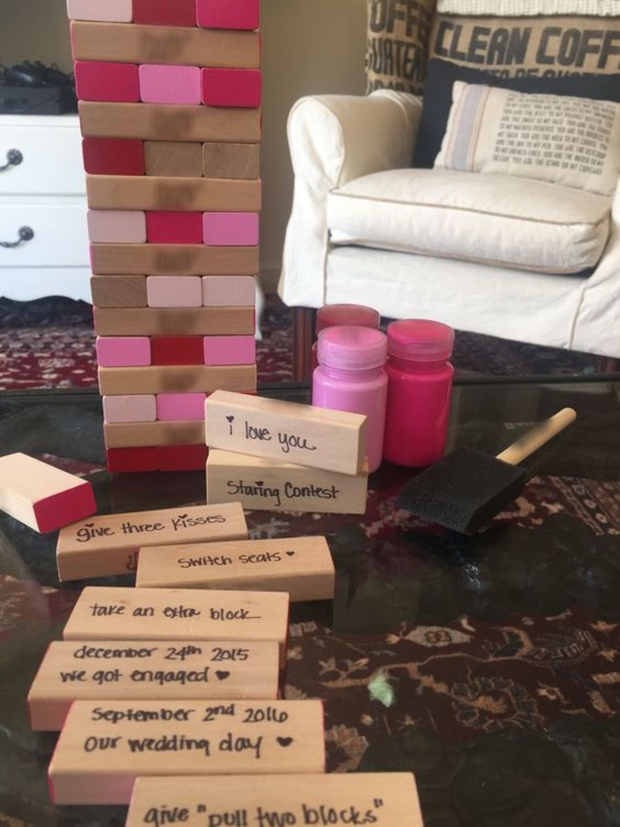Jenga board game - Every time you push out one of the blocks, you have to follow the instructions. Use a pen or thin to write different love-themed instructions on the blocks.