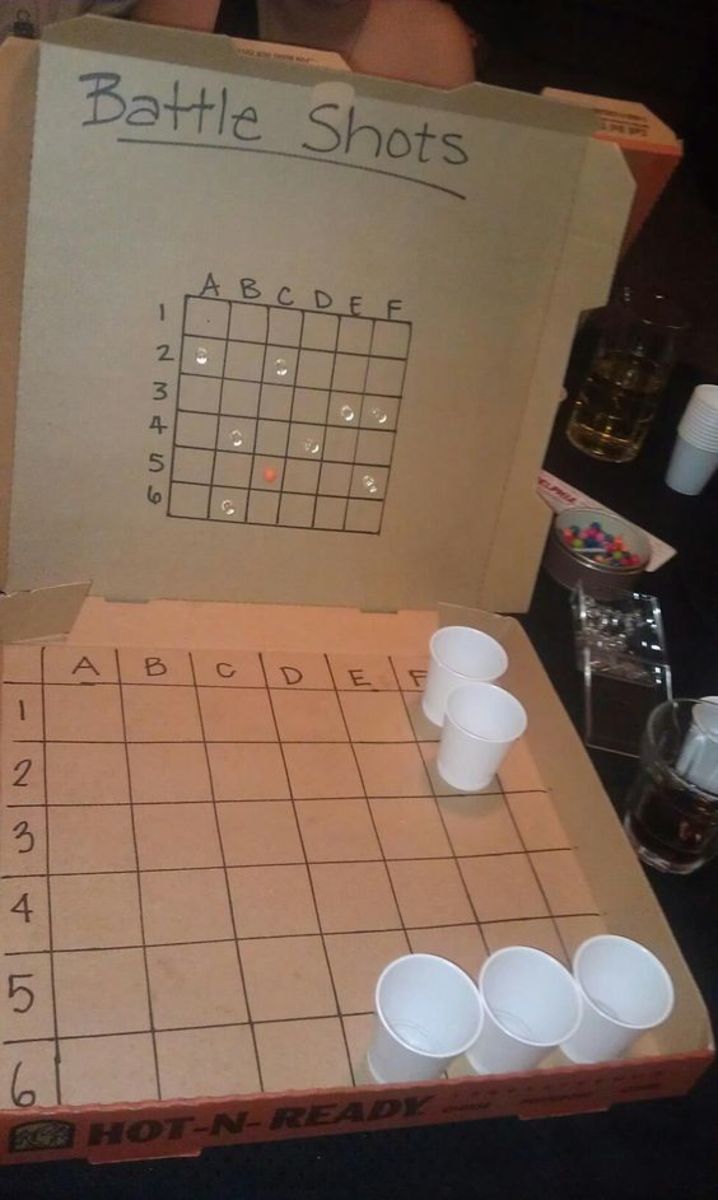 Battle Shots from Pizza boxes, markers, push pins and shot glasses ( small plastic cups.)