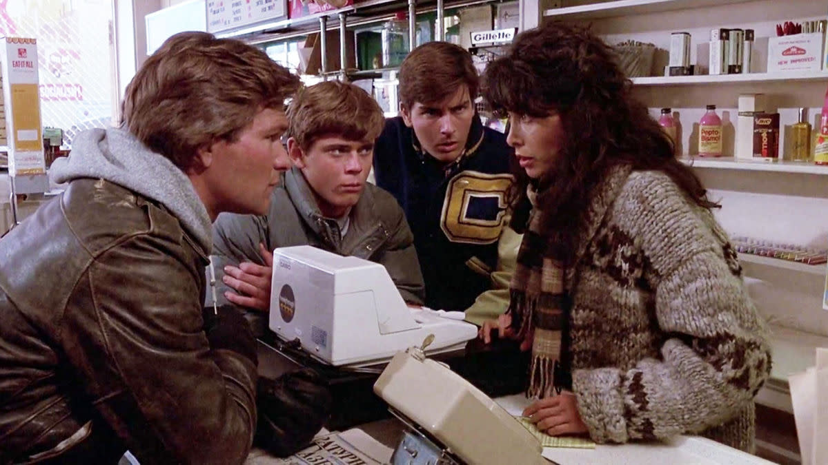 Led by Jed (Patrick Swayze) Robert (C. Thomas Howell) and Matt, store clerk Alicia (Elan Oberon) brings them up to date on WWIII and that they're being hunted