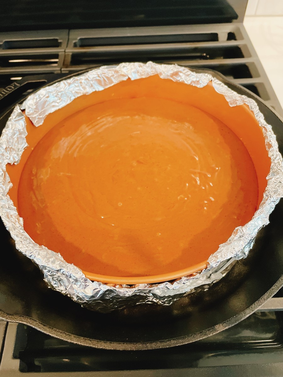 Transfer the baking pan to the prepared iron cast pan or roasting pan.