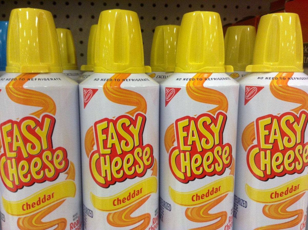 One advertisement for EasyCheese read "'For best results, remove the cap" 