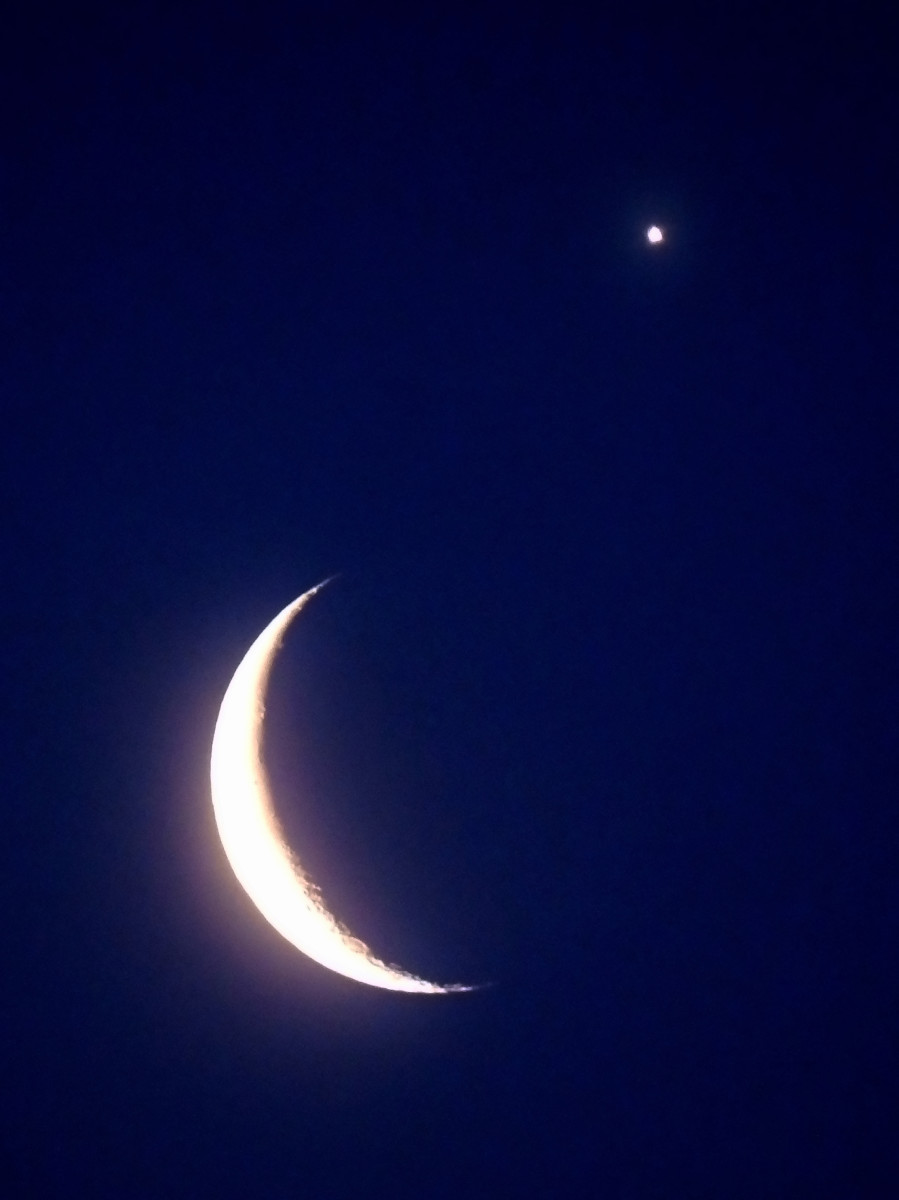 from wikipedia commons. Two of three symbols for Wadd; the moon and Venus