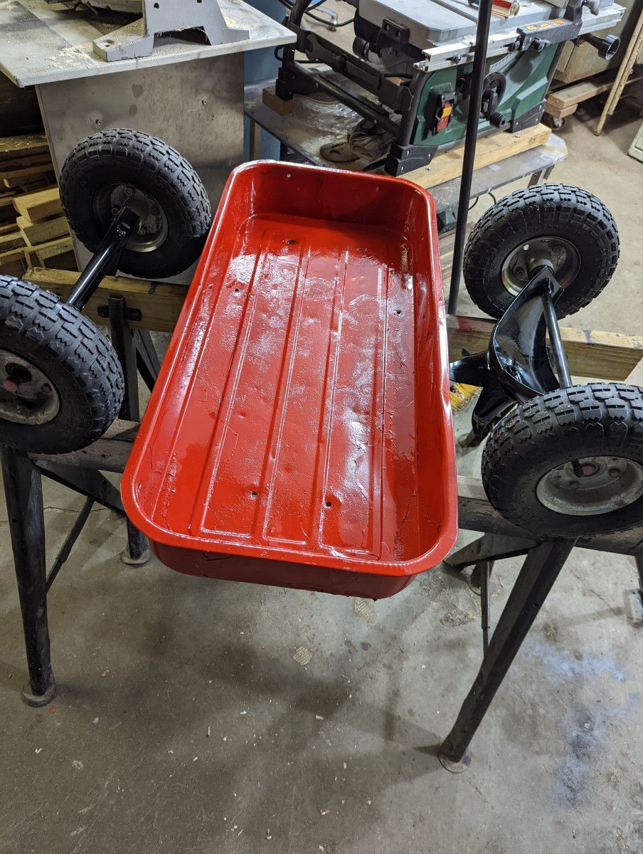 little-red-wagon-repainting-with-a-little-red-and-black-paint