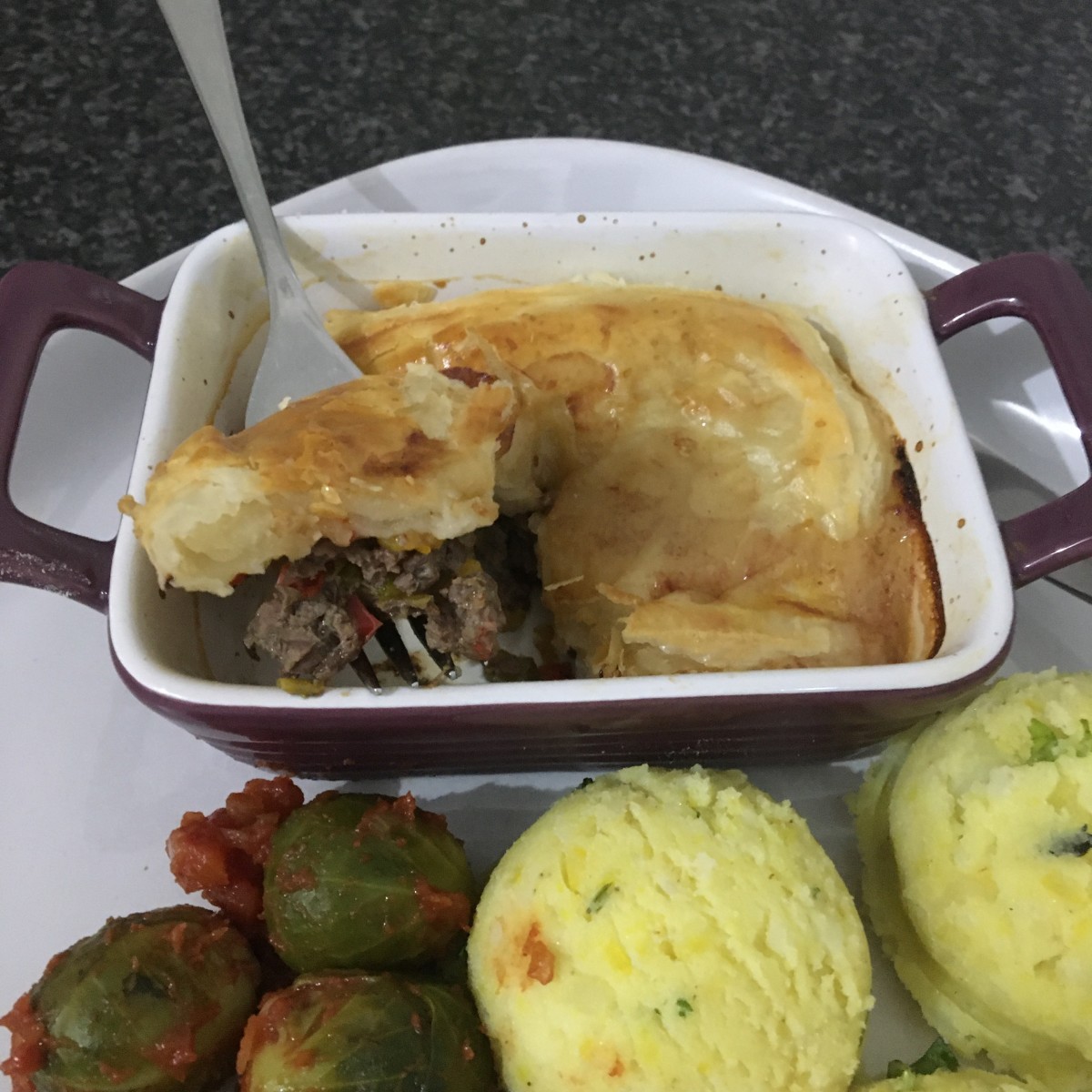 Bell pepper and pigeon pot pie with turmeric mash and spicy sauce sprouts