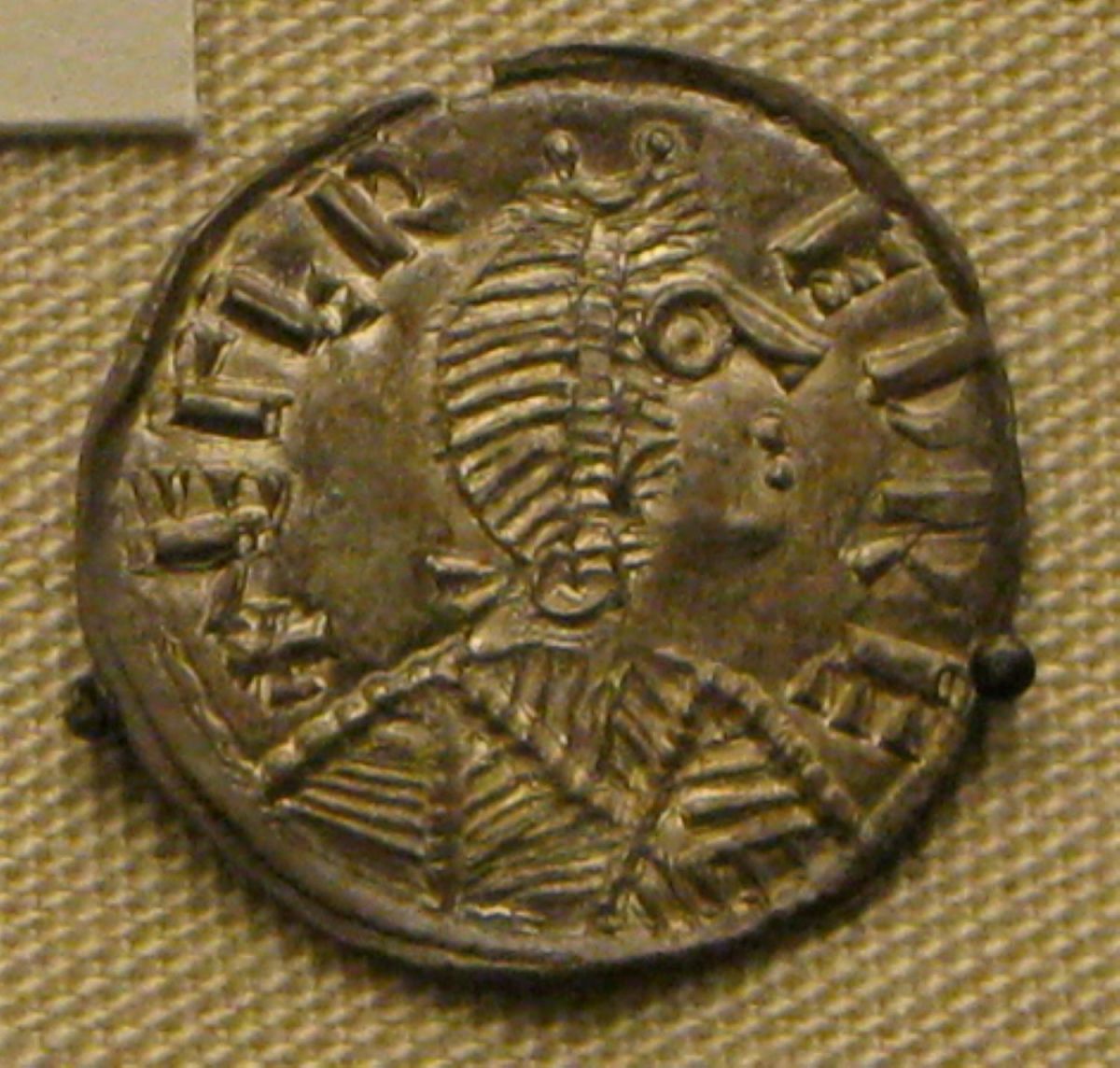 A silver coin from the reign of King Alfred the Great.