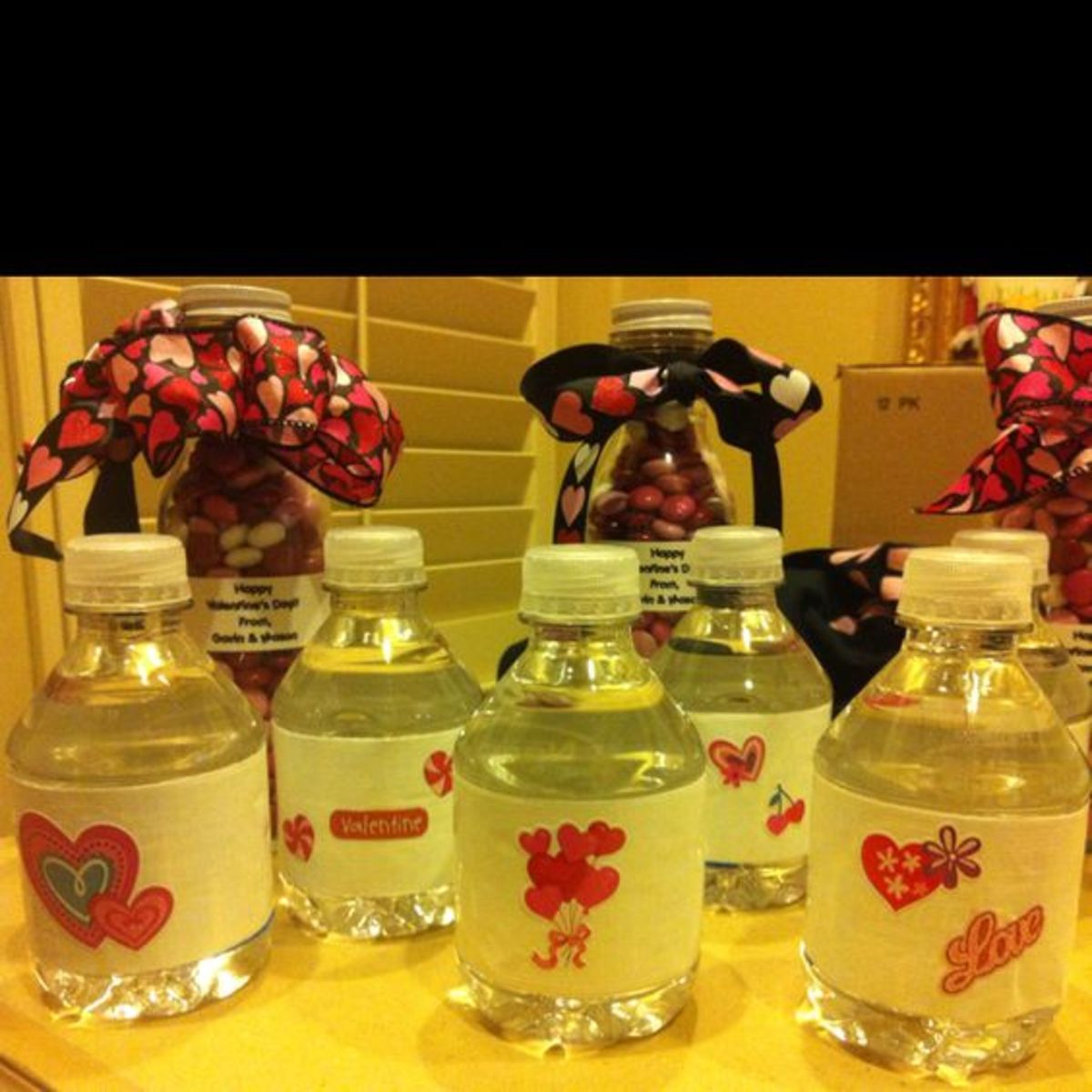 Cute Mini Waters for the Class Valentine party... Easy to cover label with Duct tape, add cute holiday stickers, and plenty of room for the kids to write their names on it.