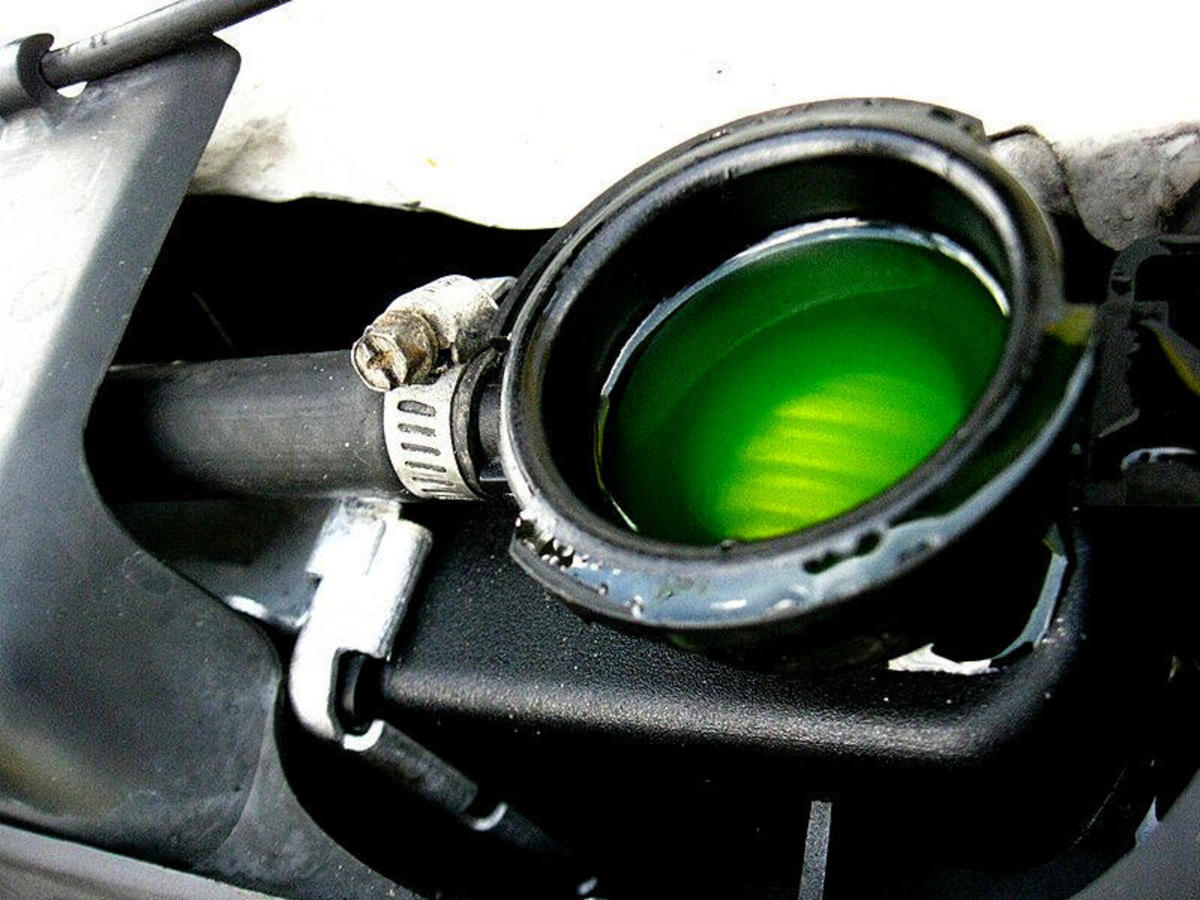 Signs of a Bad Water Pump AxleAddict