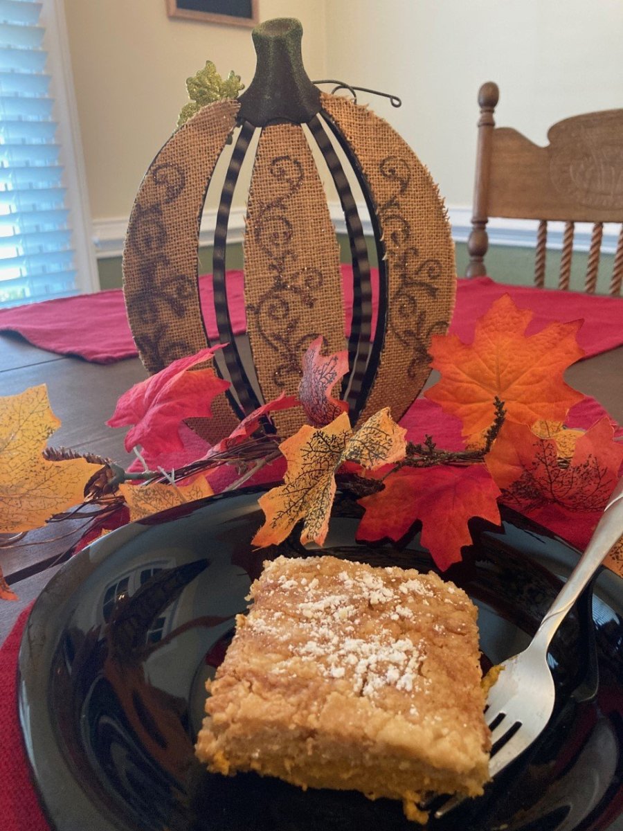 Pumpkin custard cake can be served warm or cold with a sprinkle of powdered sugar or a dollop of whipped cream.