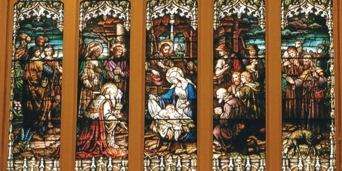 Stained glass panels displaying "Adoration of the Magi"