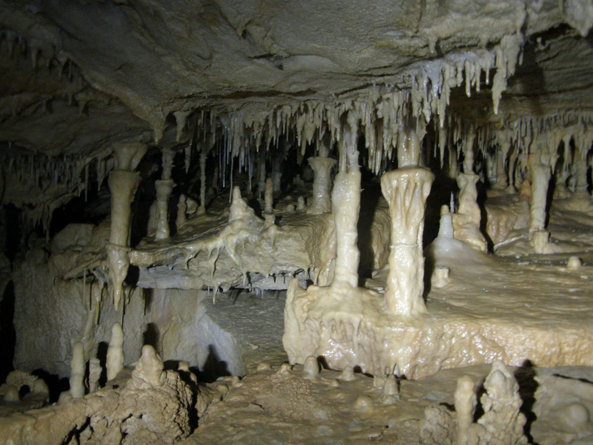 Nature's Meet & Greet - "Stalactites form like icicles on a hardened heart. Stalagmites, in turn, rise from the floor like statuettes to meet them, offering warmth and solace."