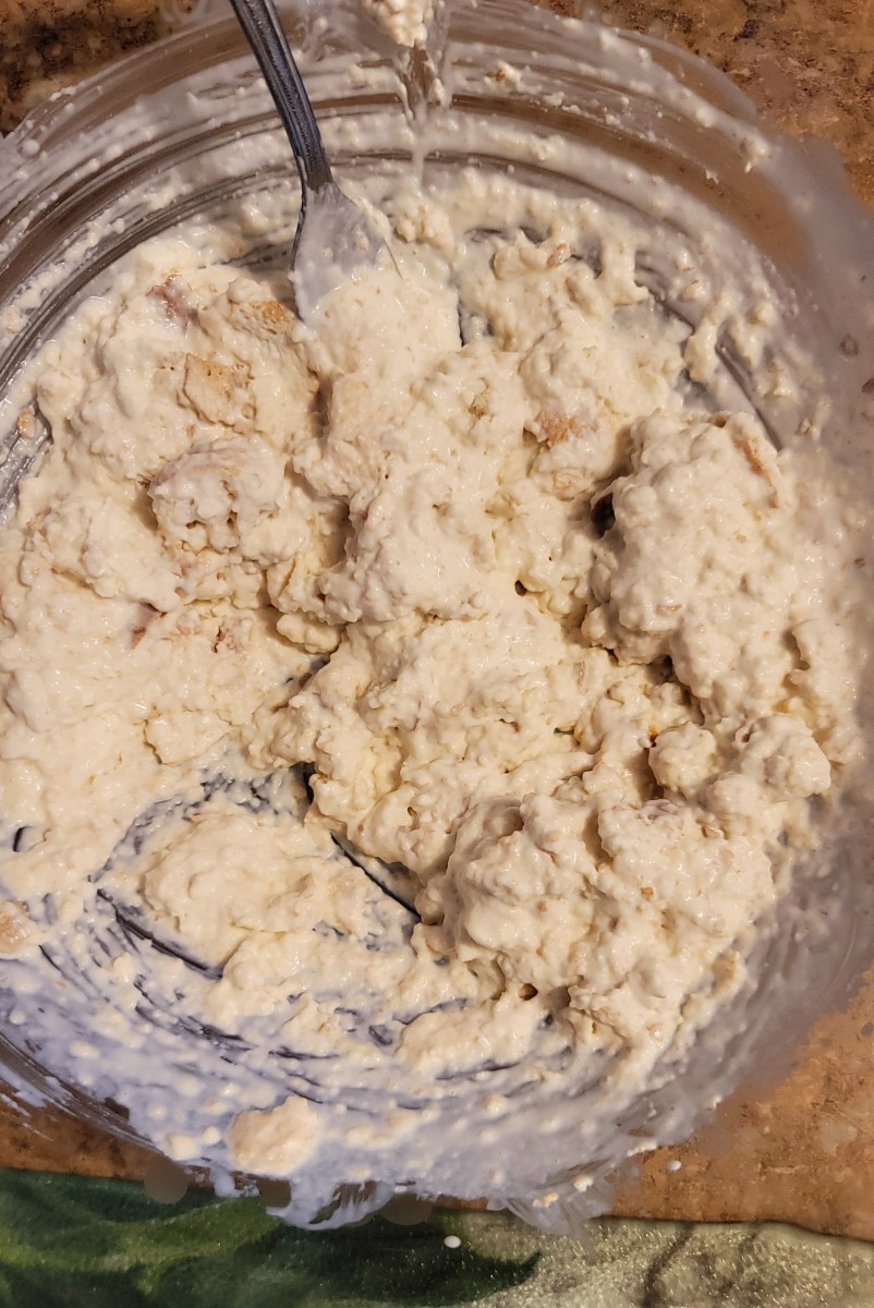 Combine bread and heavy cream with a fork to make panade.