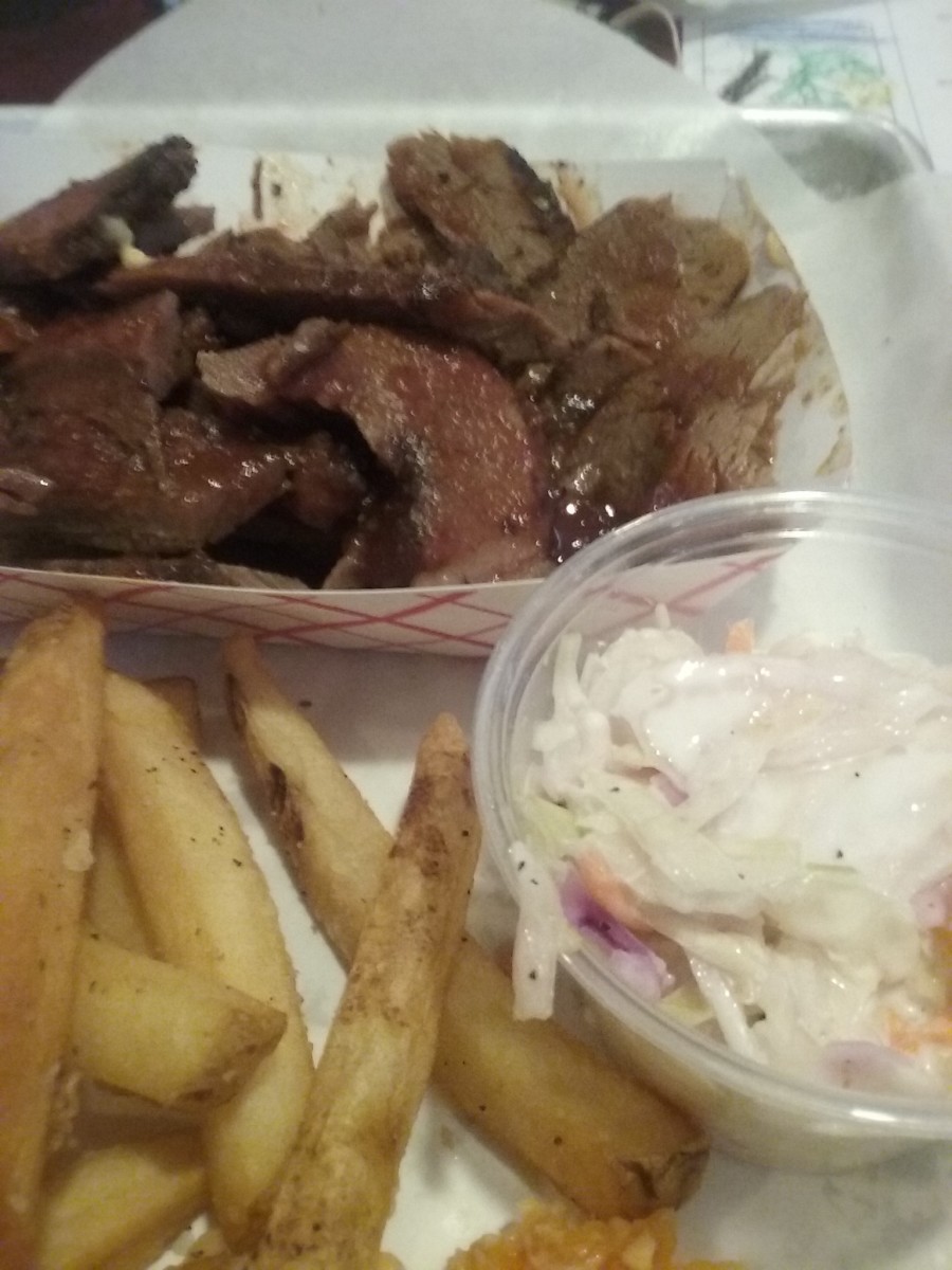 beef brisket with french fries and cole slaw 