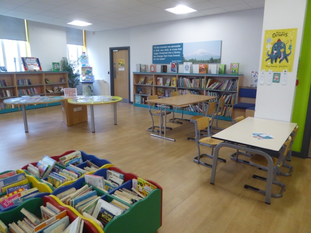 This library has a great storytime setup with open space, tables for crafts, easy-clean surfaces, and easy-to move furniture. Add a few adult-sized chairs for moms with babies and you're good to go.