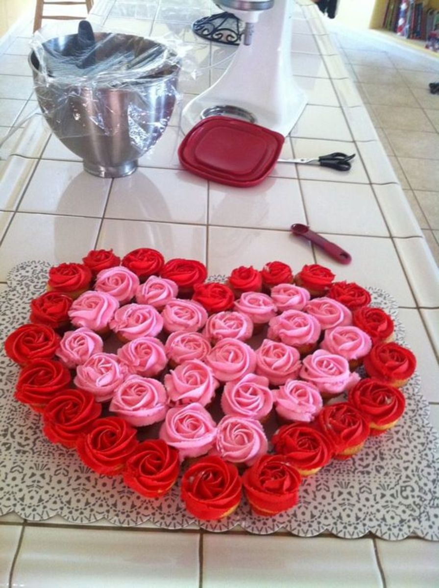 46 mini valentine cupcakes. Icing is buttercream with butter and vanilla flavor