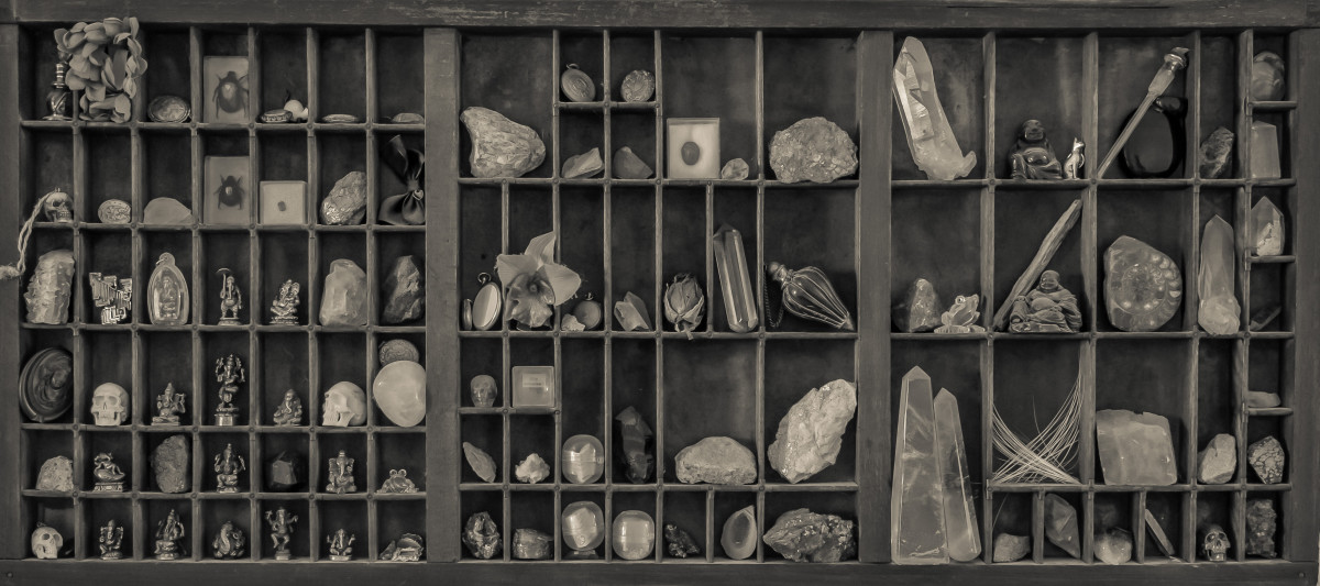 A Victorian "Cabinet of Curiosities", displaying crystals, skulls, and fossils, among other curios.